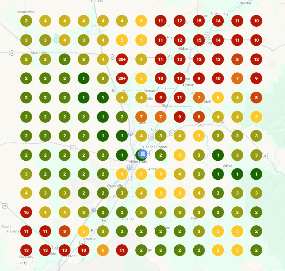Local Falcon grid scan over the Idaho Falls service area, with green ranking dots clustered near the business location and red dots further out.